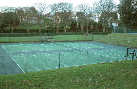 specialist cleaning methods for tennis court and rubberised play surfaces