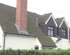 Roof before pressure washing