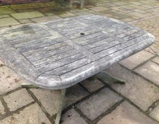 Garden table before pressure washing